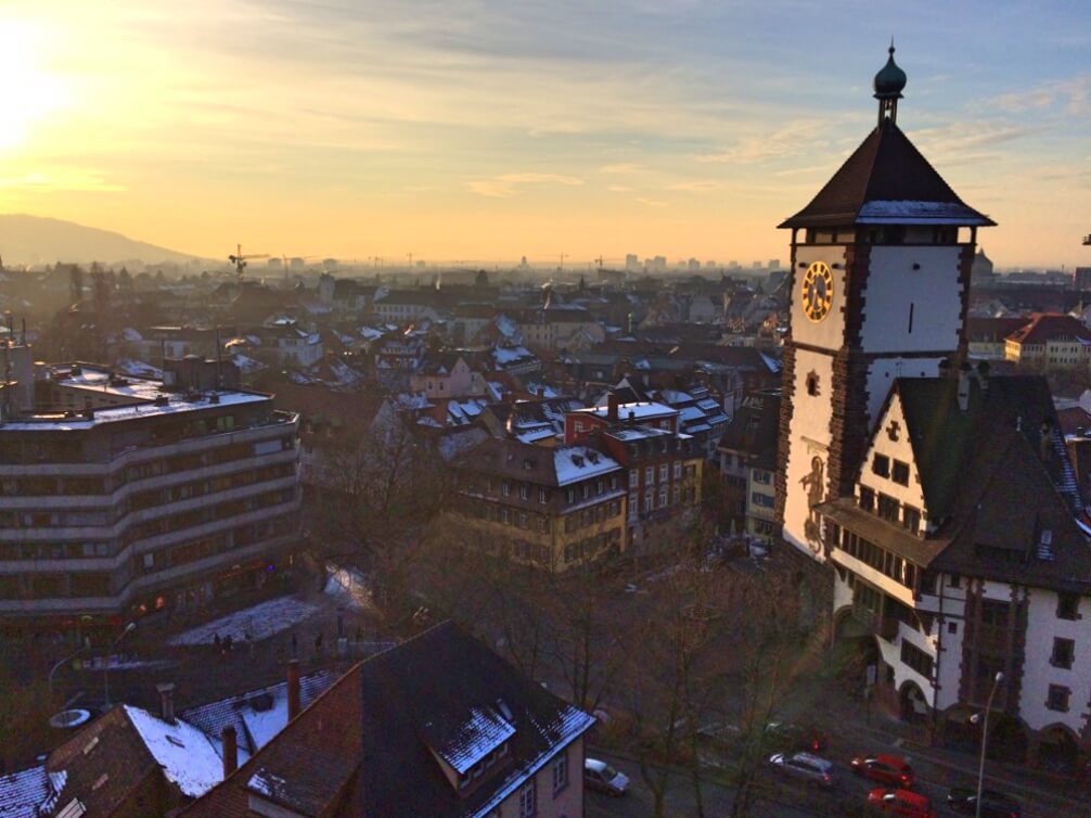 Sunset view of Schwabentor and Freiburg city